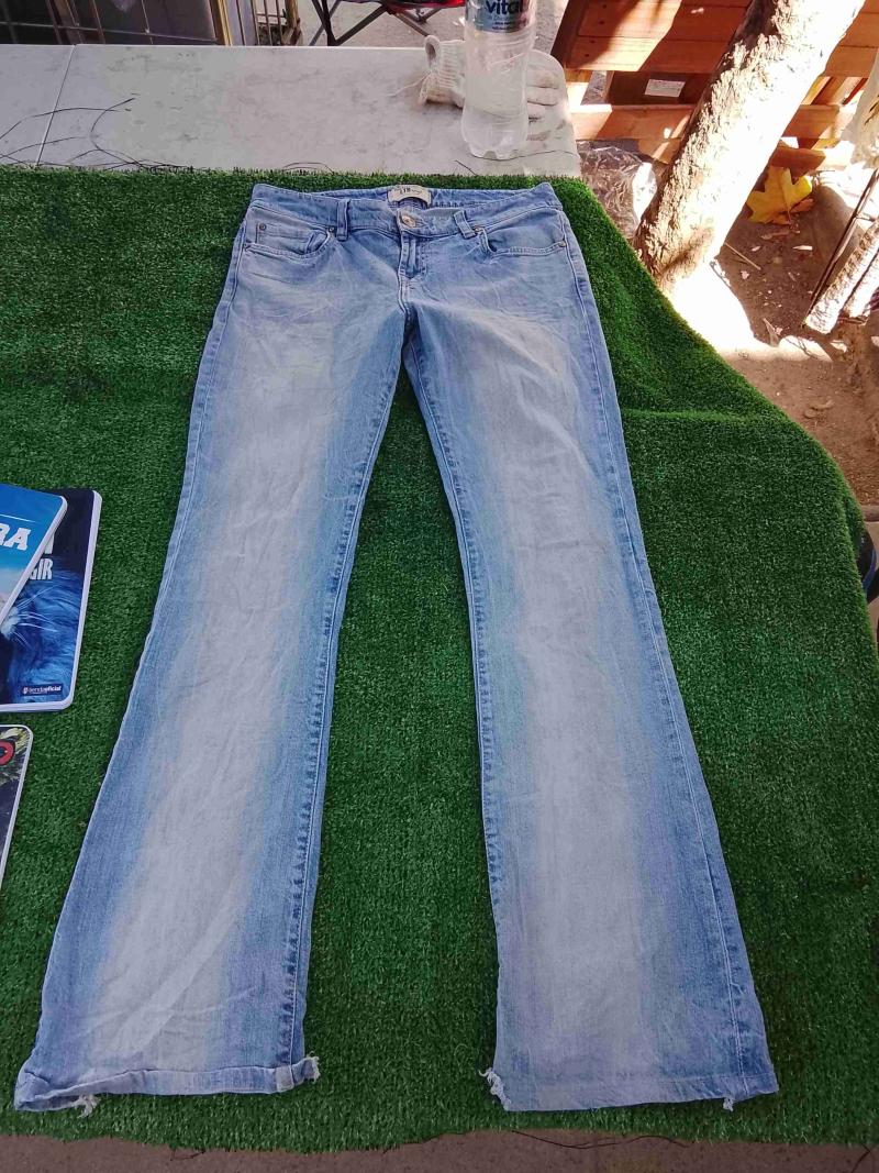 Jeans celestes semi pie-elefante