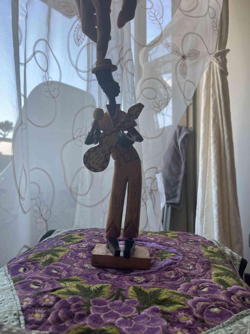 Figura decorativa de músico